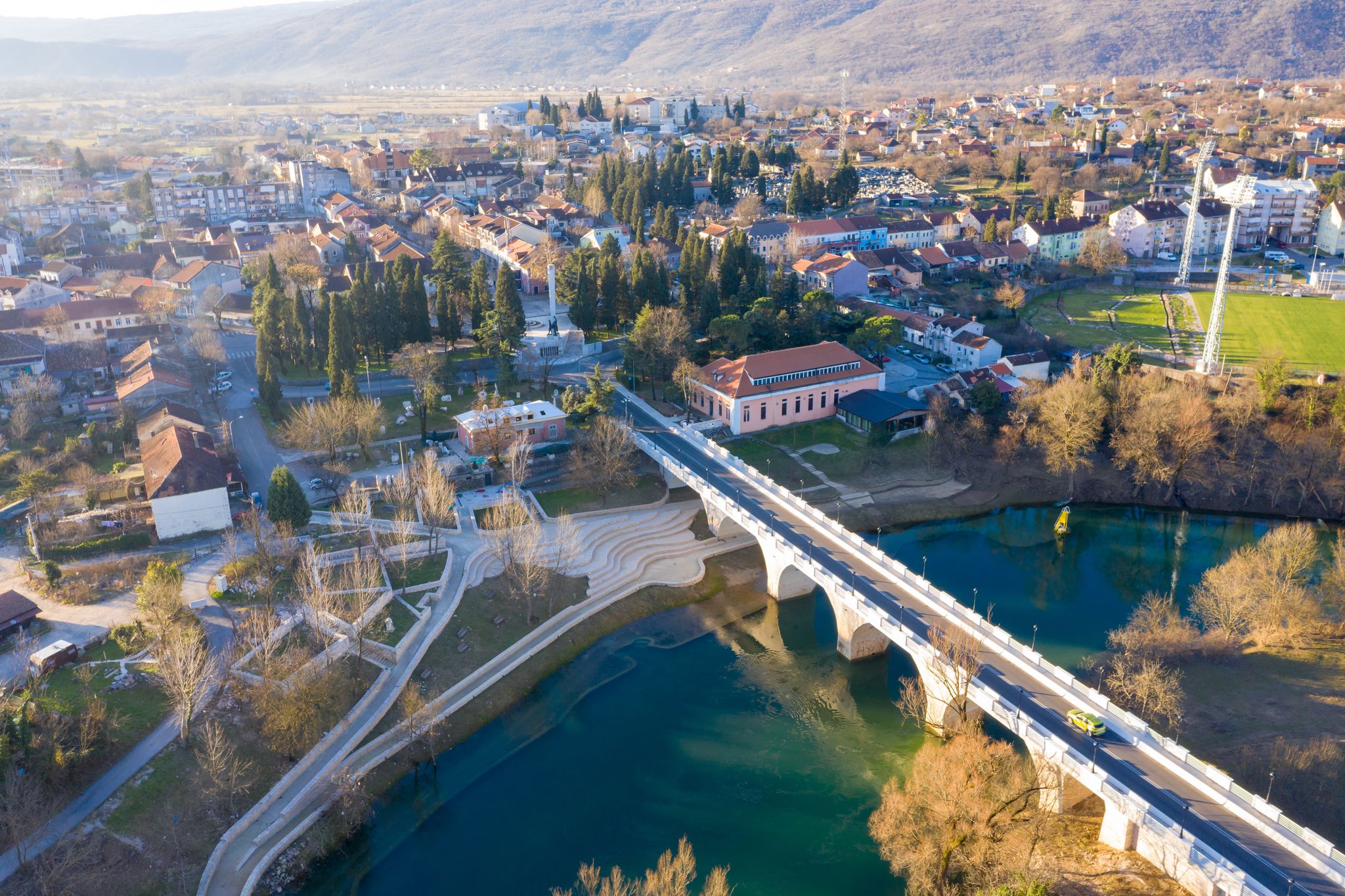 Photo of aerial view of Danilovgrad Montenegro, bridge on Zeta river on the way to Ostrog monastery and the downtown park.