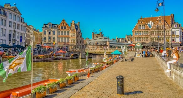 Photo of view of Graslei quay and Leie river in the historic city center in Ghent (Gent), Belgium.