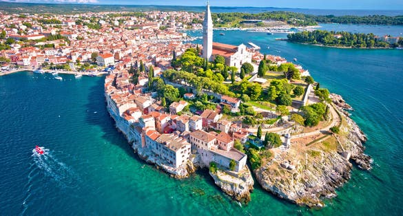 Photo of aerial view of town of Rovinj historic peninsula , famous tourist destination in Istria region of Croatia.