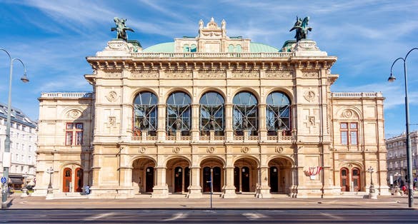 Photo of Vienna State Opera house in Austria on a sunny day.