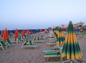 photo of view of Sunbeds on the Beach, Cattolica, Italy.
