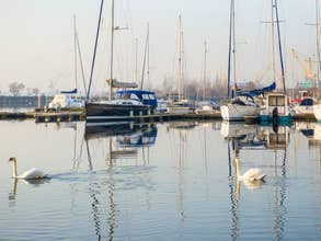 Many boats and yachts anchored at the touristic port or harbor in Mangalia, Constanta