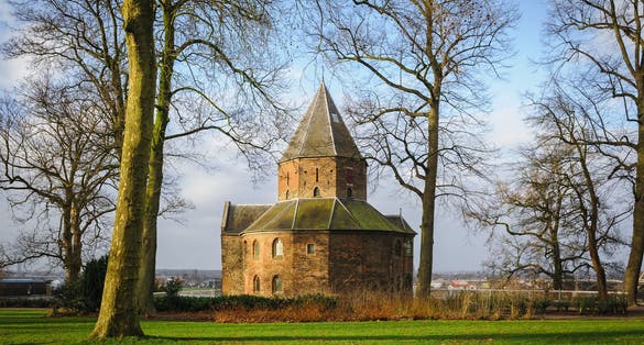 Saint Nicolas Church (Sint Nicolaas Kapel) in Park Valkhof, with the bridge Waalbrug in Nijmegen, the Netherlands