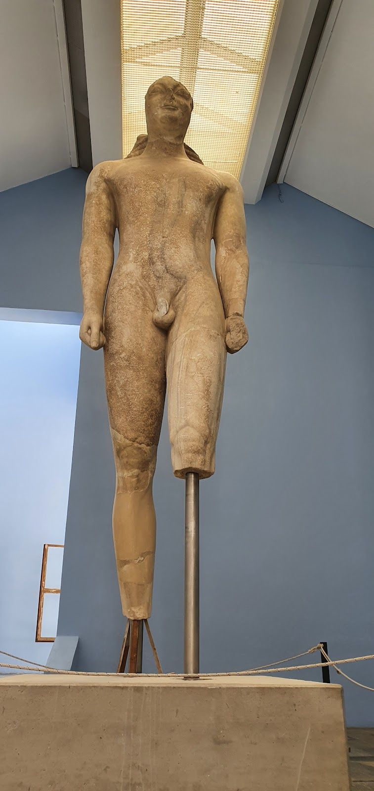 Photo of aerial view of Pythagorio port with colourful houses and blue sea, Samos island, Greece.