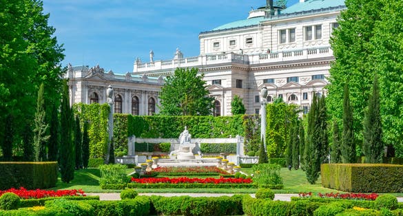 Photo of Volksgarten park and Burg theatre, Vienna, Austria.