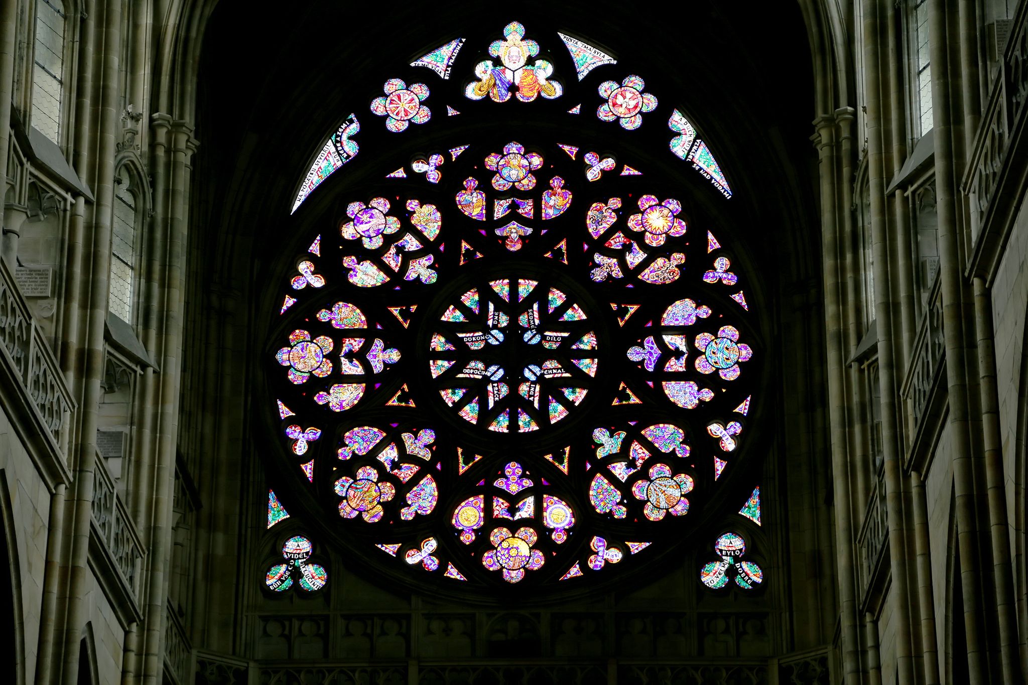Photo of art Nouveau painter Alfons Mucha Stained Glass window in St. Vitus Cathedral, Prague, Czech Republic.
