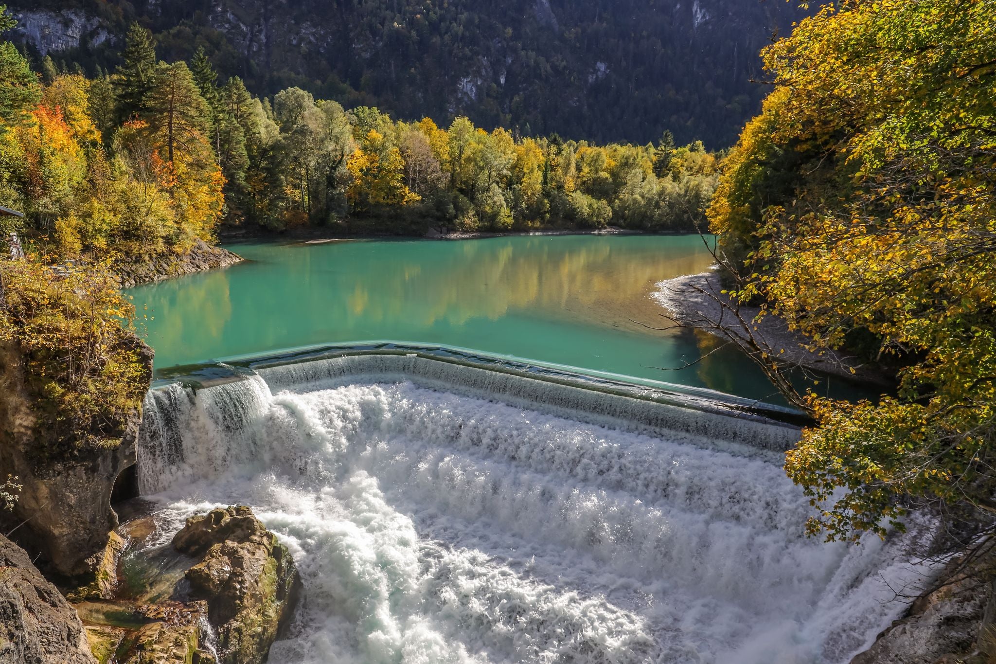 photo of view of The Lechfall is powerful waterfall along road 17 between Füssen (Germany) and Reutte (Austria).