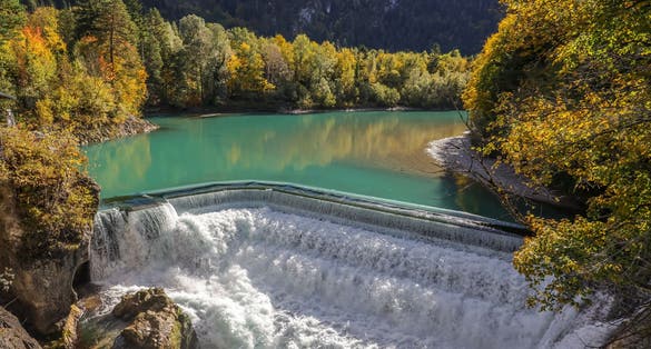 photo of view of The Lechfall is powerful waterfall along road 17 between Füssen (Germany) and Reutte (Austria).