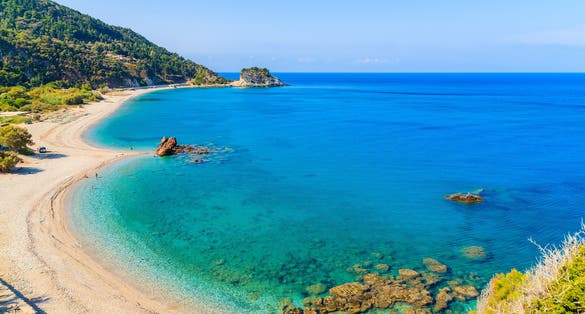 Photo of Potami beach with azure sea water, Samos island, Greece.