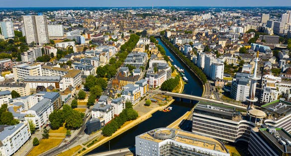 Photo of panoramic view of Rennes city with modern apartment buildings, France.
