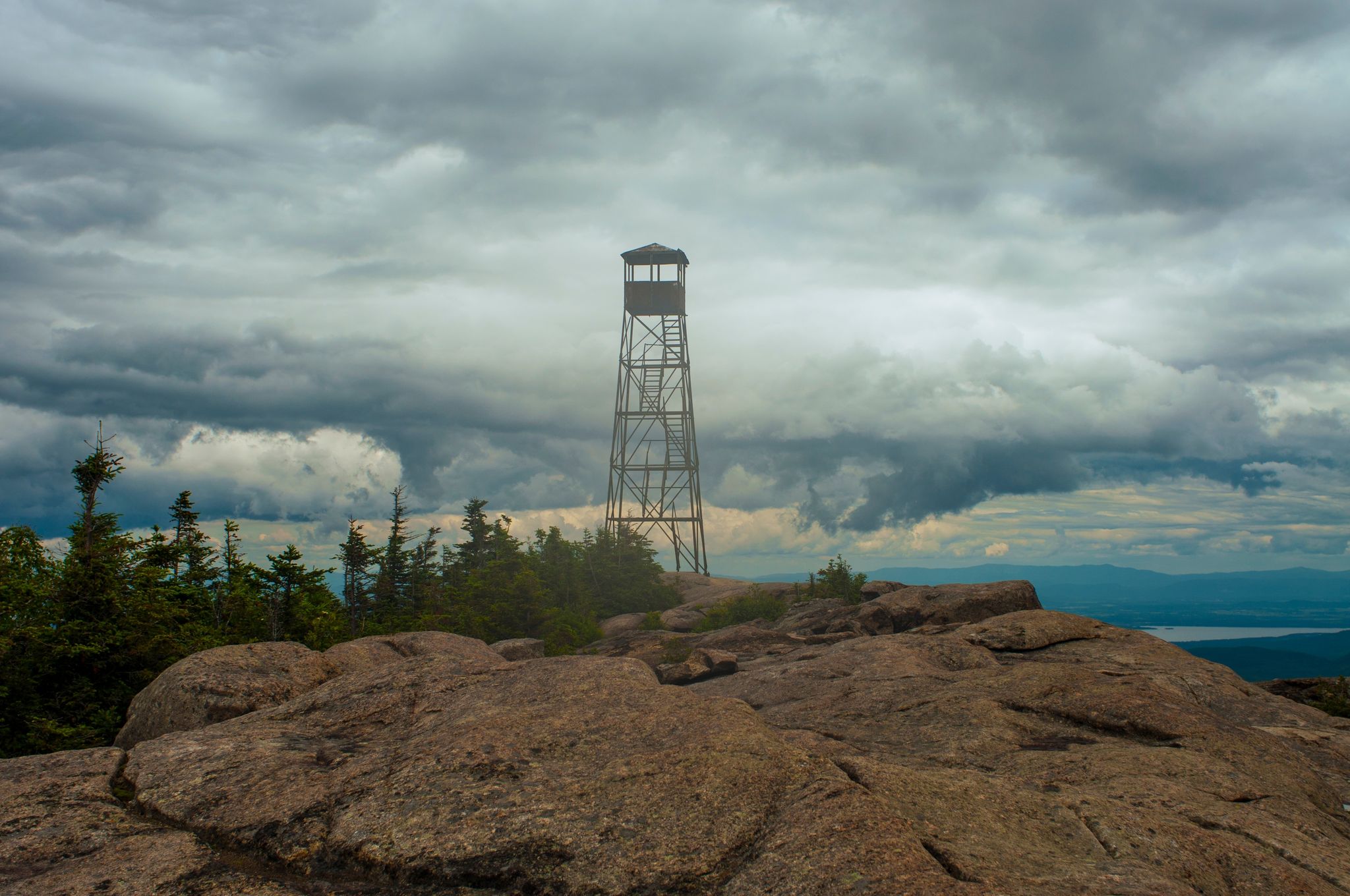 photo of The summit of Hurricane Mountain with the fire tower located on the top in the Adirondack Forest Preserve in New York State
