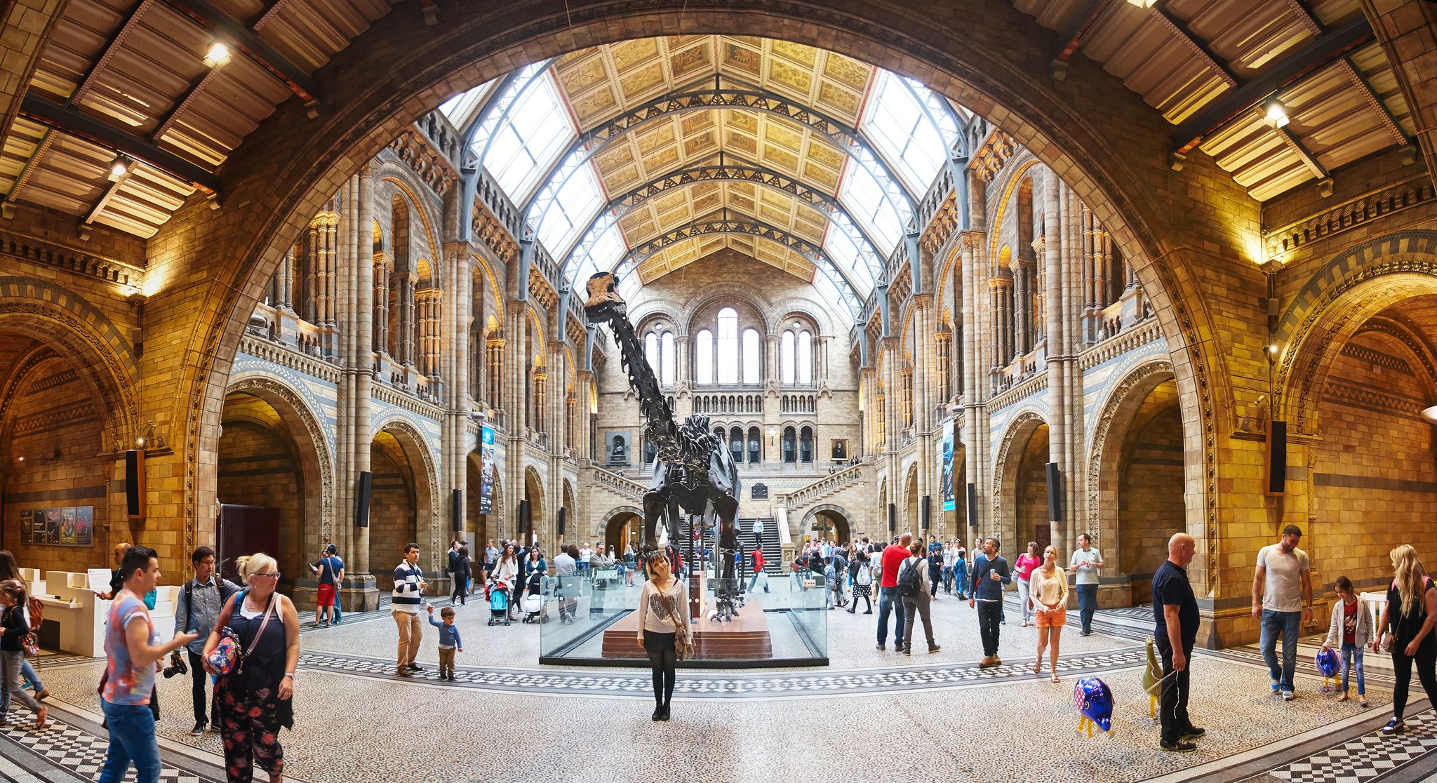People visit Natural History Museum in London, UK.