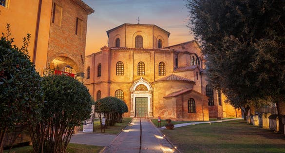 photo of Ravenna, Italy at the historic Basilica of San Vitale in the evening.