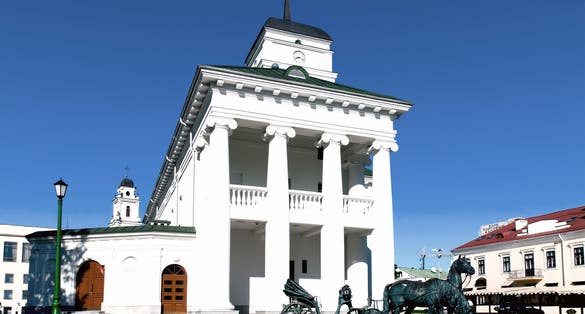 Nice summer day Belarus Minsk town hall cathedral and liberty square view