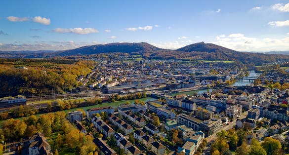 Photo of aerial view of city of Olten on a blue cloudy autumn day with beautiful autumn landscape scenery, Switzerland.