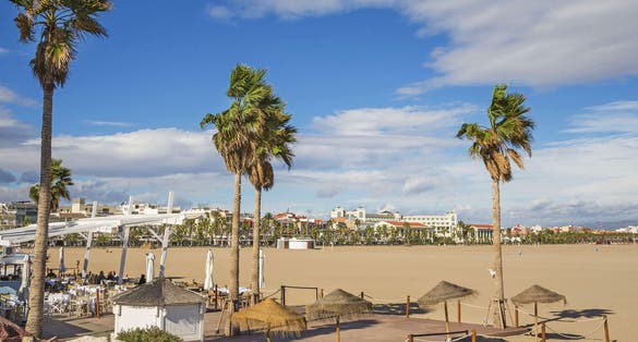 Photo of Sea front on Malvarrosa beach in the city of Valencia, Spain.