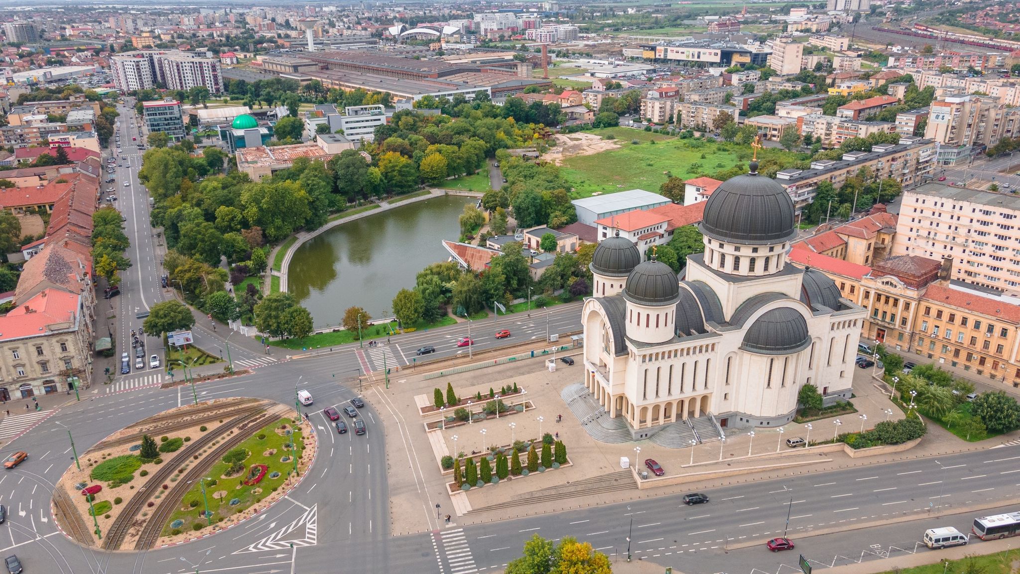 photo of view of Top view of Arad, Romania cityscape with the Orthodox Cathedral and the surounding buidings. Photography was shot from a drone at a higher altitude.
