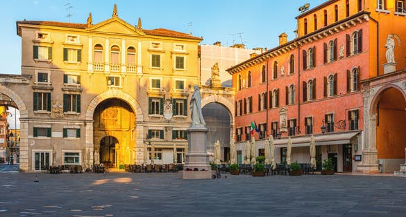 photo of Piazza dei Signori in Verona old town with Dante statue. Tourist destination in Veneto region of Italy