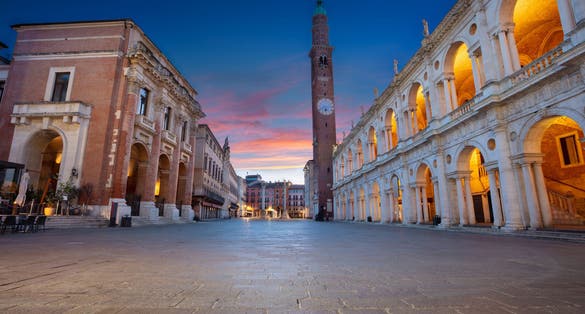 Photo of historical centre of Vicenza, Italy with old square ( Piazza dei Signori) at sunrise.
