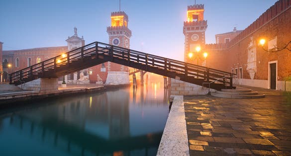 photo of view Venice, Italy at the Venetian Arsenal on a foggy morning, Venice, Italy.
