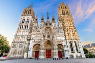 Photo of the west front of the Rouen Cathedral famous for its towers, Rouen, Normandy, France.