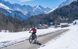 photo of aerial panoramic view of Oberstorf in Winter with snow in Bavaria, Germany.