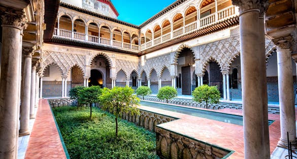 Photo of real Alcazar in Seville. Patio de las Doncellas in Royal palace, Spain.