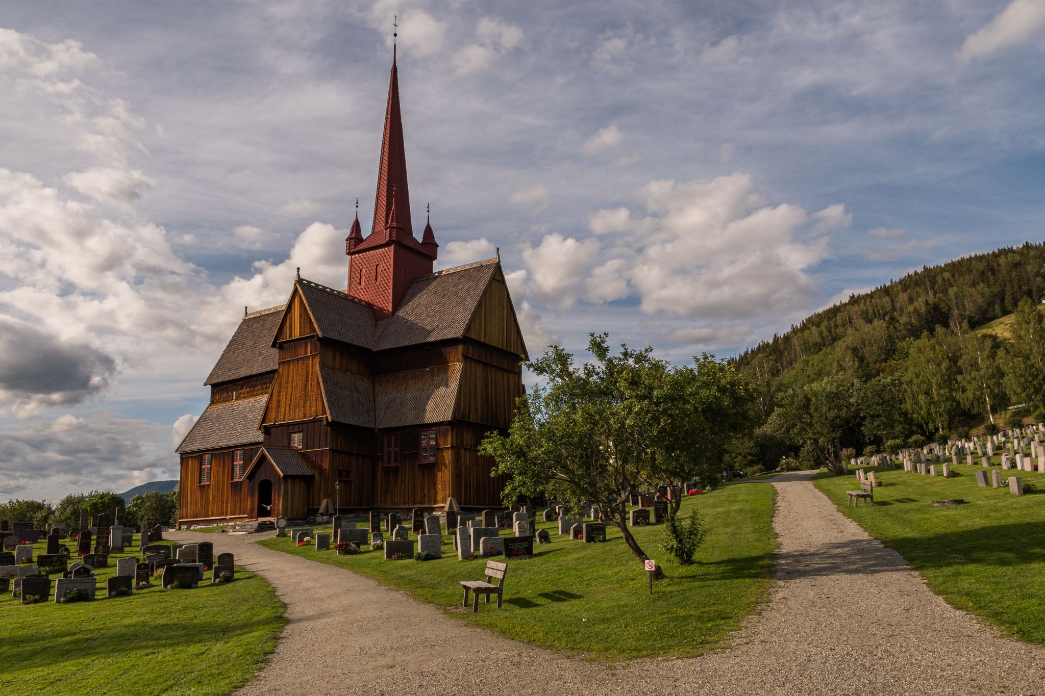 Beautiful old historic Ringebu stave church in Norway with cemetery