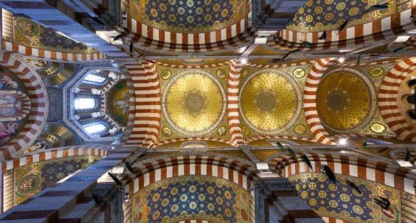 Photo of Interior View of Notre Dame de la Garde, a Byzantine architecture basilica in Marseille, France.