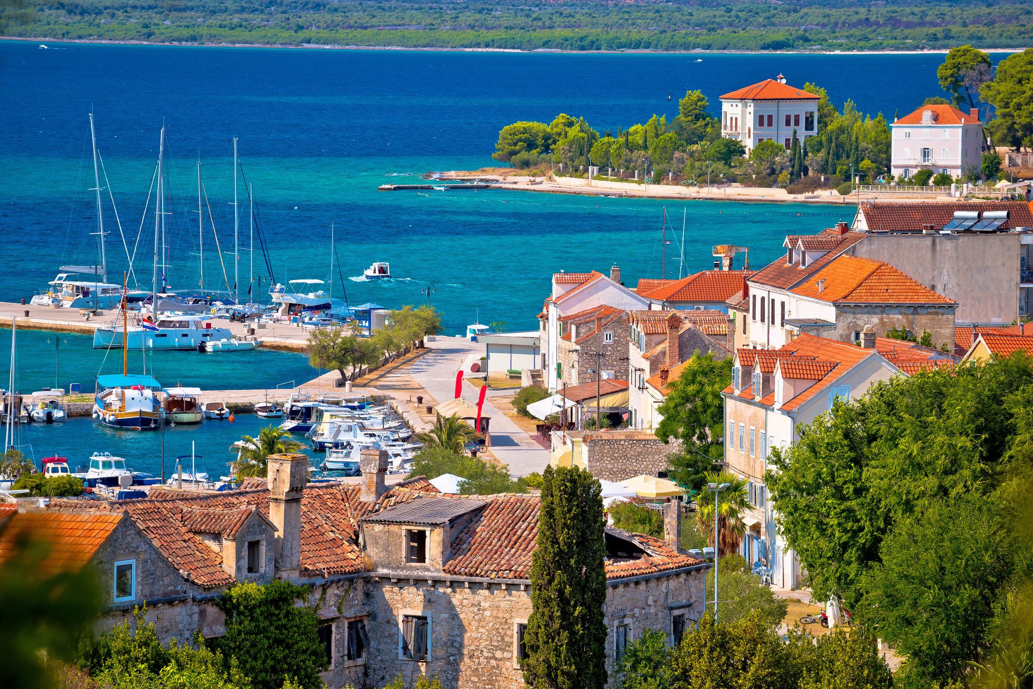 photo of view of Island of Zlarin waterfront view, Sibenik archipelago of Dalmatia, Croatia.