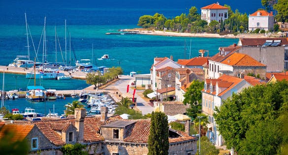 photo of view of Island of Zlarin waterfront view, Sibenik archipelago of Dalmatia, Croatia.