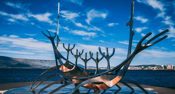 photo of the sun voyager stainless steel sculpture, a dream of hope, progress and freedom, Reykjvik, Iceland