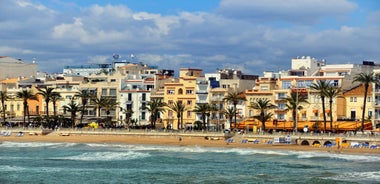 Photo of Sand beach and historical Old Town in mediterranean resort Sitges near Barcelona, Costa Dorada, Catalonia, Spain.