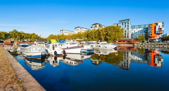 Photo of boats and yachts on the Erdre river dock in Nantes city, France.