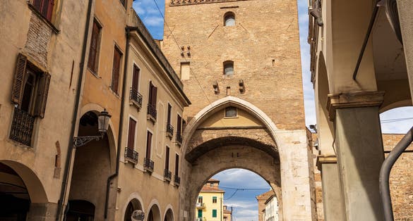 Padua downtown. Ancient medieval gate called Porta Molino or Porta dei Molini (mill gate) and fortified walls, XIII century, and Roman bridge (Ponte Molino). Veneto, Italy, Europe.
