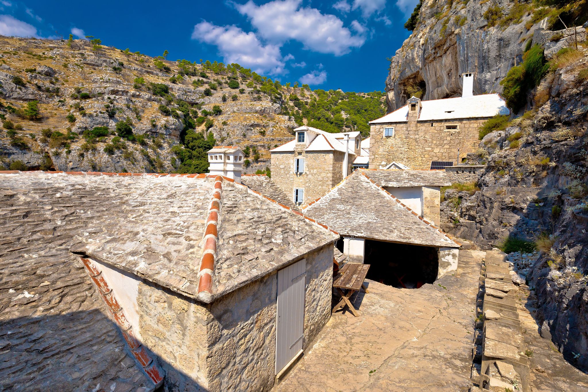 Photo of Pustinja Blaca hermitage on the rock, island of Brac, Dalmatia, Croatia.