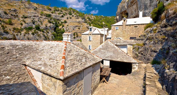 Photo of Pustinja Blaca hermitage on the rock, island of Brac, Dalmatia, Croatia.
