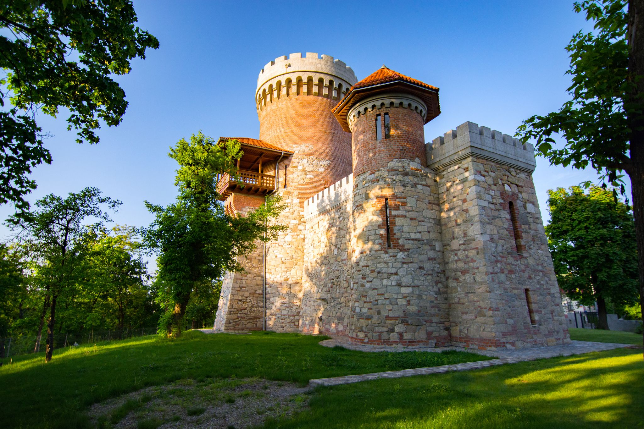 Photo of atmospheric architecture of Vlad Tepes castle in Bucarest's Carol park, Romania.