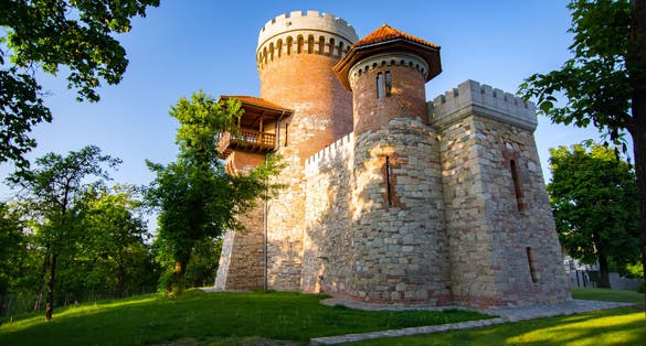 Photo of atmospheric architecture of Vlad Tepes castle in Bucarest's Carol park, Romania.