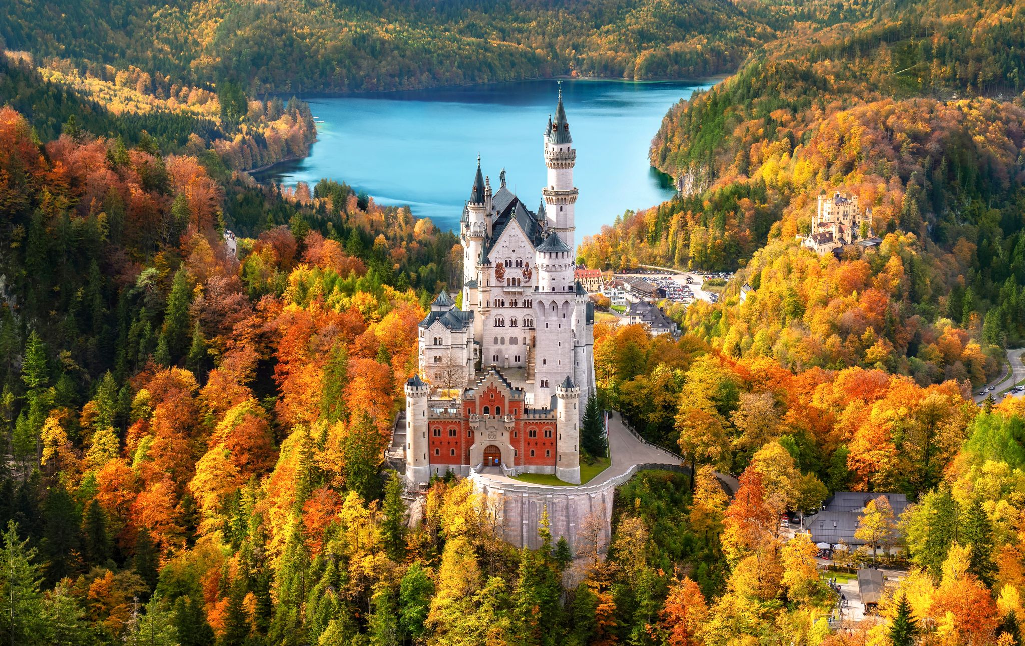 Photo of aerial view of Neuschwanstein Castle ,Autumn in the Bavarian Alps, the jewel of Germany.