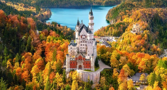 Photo of aerial view of Neuschwanstein Castle ,Autumn in the Bavarian Alps, the jewel of Germany.