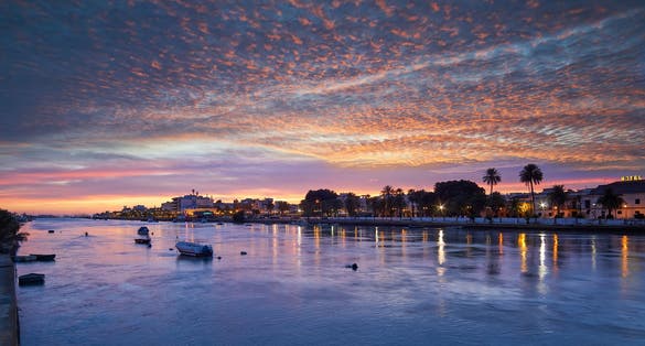 Breathtaking Orange Blue Sky at Dusk Guadalete River Puerto de Santa Maria Cadiz Spain.