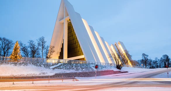 Tromso Arctic Cathedral Church in Norway at dusk twilight.