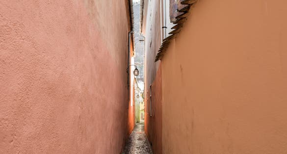 Photo of String Street (Strada Sforii) is the narrowest street in the city of Brasov, Romania. 