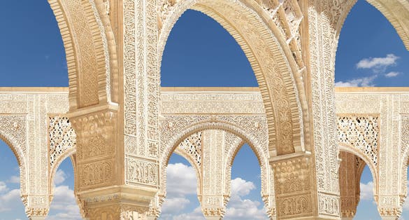 Photo of Arches in Islamic (Moorish) style in Alhambra, Granada, Spain .