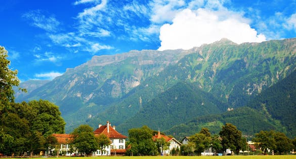 Photo of Interlaken is a Swiss town. It is an important and well-known tourist destination in the Bernese Oberland region of the Swiss Alps.