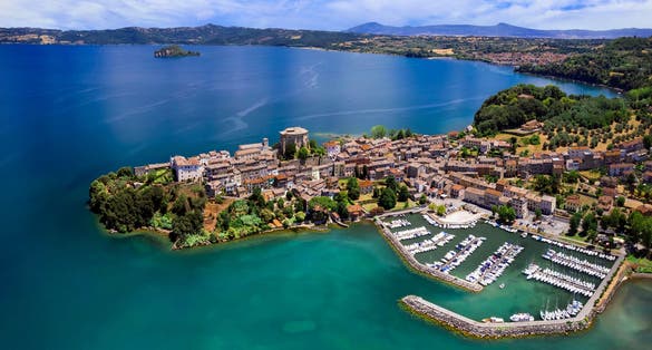 Scenic lakes of Italy - beautiful Bolsena. aerial view of Capodimonte medieval village. Viterbo province, Lazio region