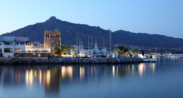 Photo of Puerto Banus at dusk, marina of Marbella, Spain.