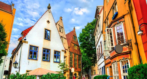 photo of view of Traditional colorful houses in historic Schnoor neighborhood in Bremen, Germany.
