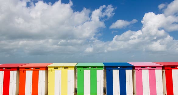 Photo of Colorful beach huts along the North Sea at Malo Les Bains in Northern France .